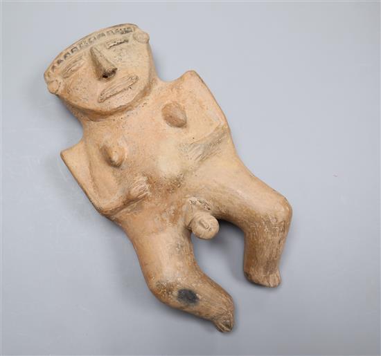 A Pre-Columbian pottery fertility figure (Muisca culture), with certificate of authenticity length 22cm (a.f.)